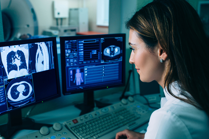 radiologist reading an xray